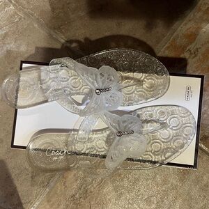 Coach clear butterfly flip flops